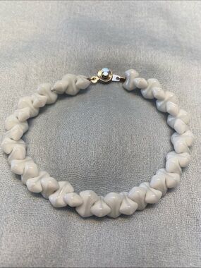 Cute beaded bracelet! Unique white beads with silver clasp.
